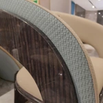 Barrel-Back Dining Chair with Woven Leather Accents, High-Gloss Wood Frame and Vertical Back Strap
